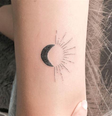 moon tattoo tribal|minimalist full moon tattoo.